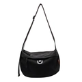 Minimalist black canvas dumpling crossbody bag with adjustable strap and orange label detail - Black