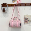 Pink cylinder shoulder bag for kids in durable canvas with adjustable straps and zip design - Pink