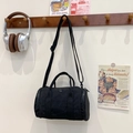 Minimalist black nylon cylinder bag for kids with twin handles and adjustable strap - Black