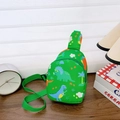 Cute green kids crossbody chest bag with vibrant cartoon dinosaur prints and adjustable strap - Green