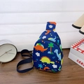 Kids navy chest bag with colorful dinosaur print and adjustable strap in cozy setting - Navy Blue