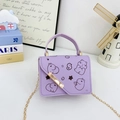 Mini lavender crossbody bag with cute Capybara cartoon print and gold chain strap - Purple
