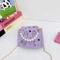 Light purple girls' shoulder bag featuring cute capybara prints and pearl handle - Purple