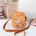 Orange kids crossbody bag with cute cartoon bear print and adjustable brown shoulder strap - Orange