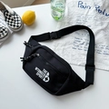 Black canvas chest bag for kids featuring a white sport logo and adjustable strap - Black