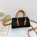 Mini handbag for girls in black litchi grain leather with contrast orange-brown handle - Black
