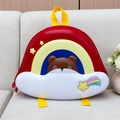 Detail of cute bear and colorful rainbow stripes on hardshell toddler backpack - Red
