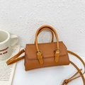 Brown mini girls handbag with lychee pattern leather and adjustable shoulder strap - Brown