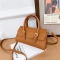 Borsa a mano per bambini in pelle marrone con fibbie dorate e tracolla sottile - Marrone