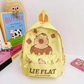 Pale yellow kids backpack with cartoon capybara print and durable canvas fabric - Yellow