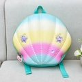 Detail view of colorful shell backpack with gradient macaron colors and star patches - Green
