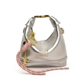 Silver crescent girl's handbag with metallic finish and gold key pendant charm - Silver