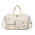 Sac à langer matelassé beige avec broderie ours jaune et bandoulière réglable - Style ours