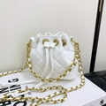 Stylish white quilted bucket bag for kids with gold chain strap and drawstring closure - White