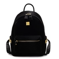 Black fashion backpack for women with woven texture and gold pyramid studs on white background - Black
