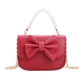 Red kids mini crossbody bag with large bow and white pearl handle detail - Red