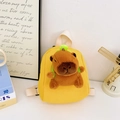 Cute yellow canvas mini backpack for kids featuring a plush Capybara doll accessory - Yellow
