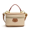 Mini beige lychee grain leather vanity bag with red handle and adjustable strap for girls - White Naked Bag