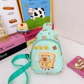Mint green Capybara cartoon crossbody bag for kids with adjustable shoulder strap - Green