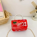 Sweet red New Year bag for kids with white floral patterns, pearls, and cherry charms - Patterned LOVE