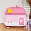 Detail of pink house-shaped kids backpack with Sunny Day text and heart decorations - Pink