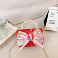 Red sequin girls handbag with pearl handle and pink bow charm for kids - Red