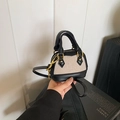 Mini shell bag in black leather and beige canvas patchwork with elegant gold zippers - Black Beige Bare Bag