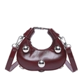 Edgy wine red crescent handbag with bold silver spherical studs and metal handle - Red