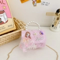 Pink girl's pearl handbag featuring a princess doll, ribbon bow, and gold chain strap - Pink Style Left Girl