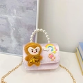 Pink girls crossbody bag with cute monkey plush doll and faux pearl handle detail - Pink Monkey