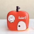 Detail of red apple shaped kids backpack with hard shell and cute rabbit print design - Orange
