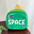 Detalle de la mochila de cohete espacial verde para niños con relieve de SPACE blanco - Verde