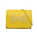 Mini yellow crossbody bag for girls with pearl bow and golden chain strap - Yellow