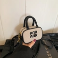 Mini beige canvas crossbody bag with black leather trim and Arir embroidery for kids - Black & Beige Bag Only