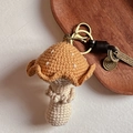Handmade crochet orange mushroom keychain with vintage gold keyring and leather tag - Khaki With Pendant