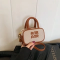 Mini canvas and brown leather crossbody bag with embossed ARIR text and top handles - Brown & Beige Bag Only
