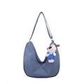 Chic dumpling-shaped crossbody bag in hazy blue nylon with a cute puppy plush pendant - Large / With Pendant / Blue