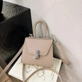 Mini beige crossbody bag for kids featuring cross-grain texture and silver lock - Khaki
