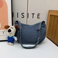 Blue nylon crescent crossbody bag for kids featuring a cute puppy plush charm pendant - Small / With Pendant / Blue