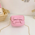 Pink mini crossbody bag for girls with cute bowknot detail and golden chain strap - Pink