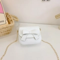 Mini white princess crossbody bag featuring large bow detail and gold chain strap - White