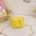 Chic girls yellow crossbody bag with a large bow detail and a fine gold chain strap - Yellow