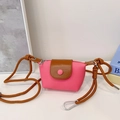 Mini crossbody bag for kids in bright pink and brown color block with litchi texture - Rose Pink