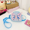 Detail van blauwe kinder schoudertas met pailletten en roze glitter vlinder - Blauw
