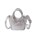 Mini borsa a secchiello argento in pelle metallizzata a pieghe con fiocco e tracolla - Argento