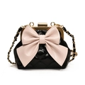 Gesteppte schwarze Mädchen-Umhängetasche mit großer rosa Schleife und goldener Kette - Schwarz & Rosa