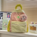 Kids' color-block backpack in pink and yellow with a cute rabbit charm attachment - Small / Pink