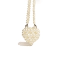 Mini heart-shaped pearl shoulder bag with chain straps for girls on white background - Heart