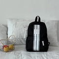 Modern black school backpack with contrast white vertical stripes and front logo patch - Black
