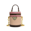Kids mini cylinder shoulder bag in pink and beige color-block textured leather - Pink and Green